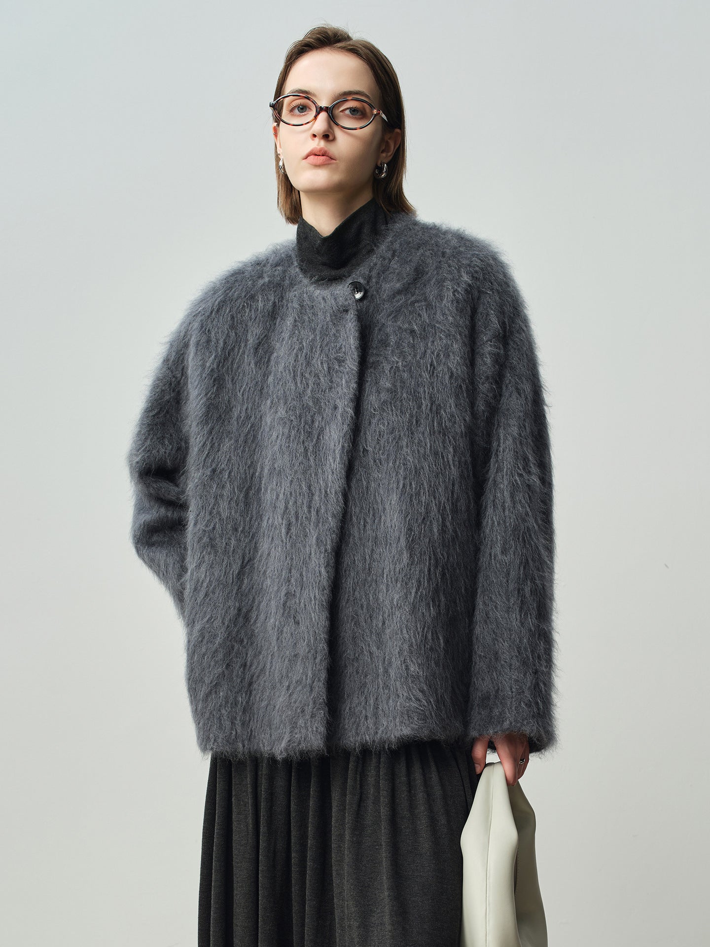 Wind wool coat women's autumn and winter long hair design sense round neck 058